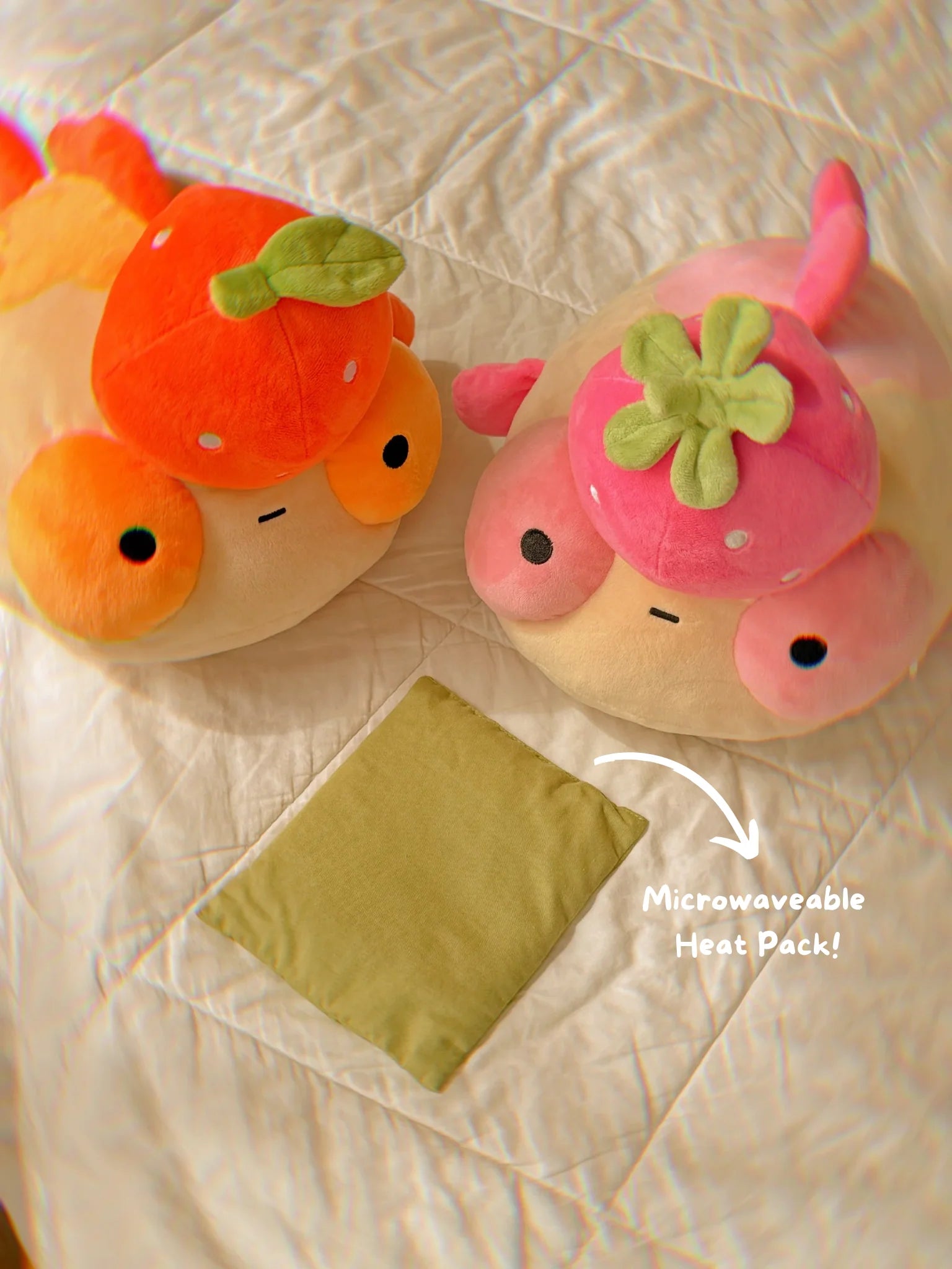 Image of both Maxine plushes and the microwaveable heat pack